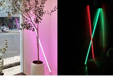 neon tube lamps in pink, red and green colors