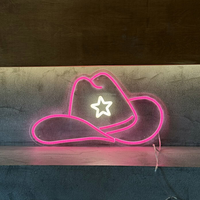 pink cowgirl hat pink neon sign