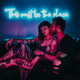 blue neon signs in dark, great for photo backdrop
