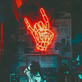 A hand-shaped neon light for wall decors